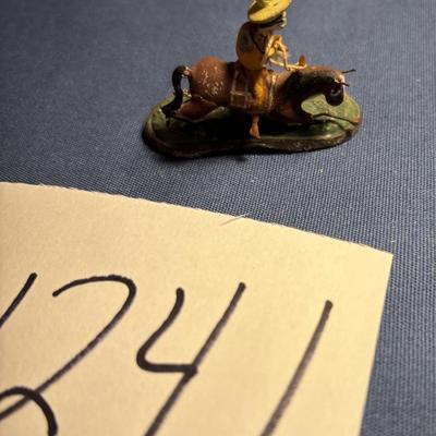 Vintage Metal Cowboy Toy