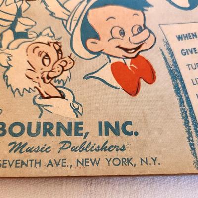 Lot #131 Souvenir Album - Disney's Pinocchio (Motion Picture) - Sheet music for all the songs
