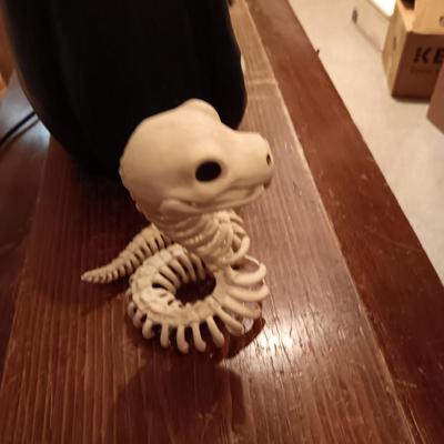 FAUX FLAME SKULL PUMPKIN, CROW AND A SKELETON SNAKE