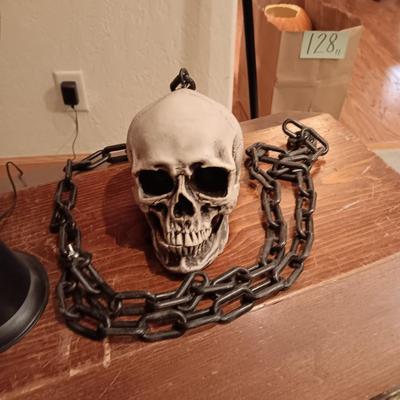 FAUX FLAME TORCH AND 2 SKULL ON CHAINS