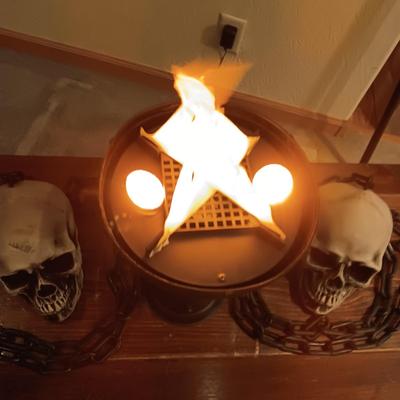 FAUX FLAME TORCH AND 2 SKULL ON CHAINS
