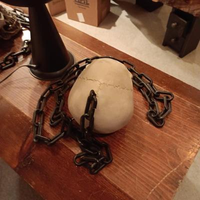 FAUX FLAME TORCH AND 2 SKULL ON CHAINS