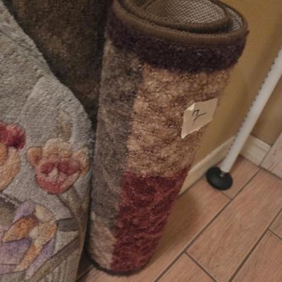 Sale Photo Thumbnail #70: 2 padded kitchen rugs
Utility room
4 different size green & pink
2 other brown tone rugs