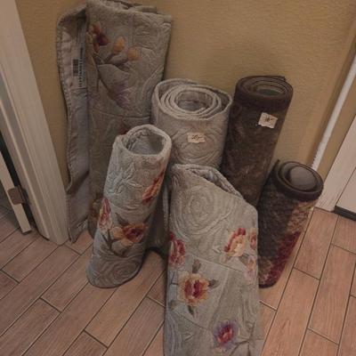 Sale Photo Thumbnail #67: 2 padded kitchen rugs
Utility room
4 different size green & pink
2 other brown tone rugs