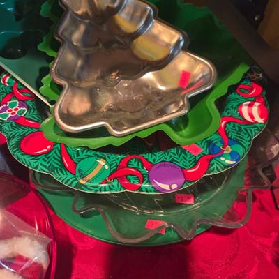 Sale Photo Thumbnail #94: Christmas decor
Dishes
Placemats
Serving pieces
3 poinsettia glass ornaments 

Table & shelves not included