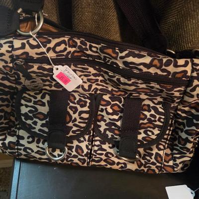 Sale Photo Thumbnail #166: Purses - Isaac Mizrahi, travel-on
Tiganello headbands 
Hats


Nightstand not included