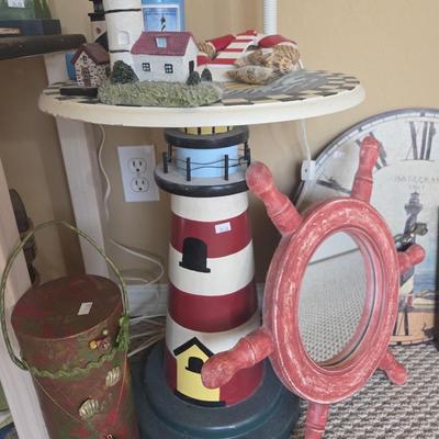 Sale Photo Thumbnail #315: Picture - 23x36
Mirror - 21x27
Square table - 14x24 1/2, 22 1/2” tall
Lighthouse table - 21” tall