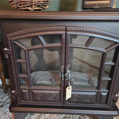 Sale Photo Thumbnail #348: Duraflame heater - 24x28, 12 1/2” deep
Set of 3 nesting tables
Lighted picture
Accu-rite weather radio
