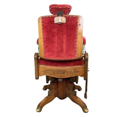 Sale Photo Thumbnail #449: "Congress Hydraulic Patented Koken Barbors Supply Co. St. Louis, USA"Adjustable headrest. Has golden finish, nickel plated trim and leather blade sharpener with quarter sewn oak Measures: 46" high x 22.5" wide (adjustable height)