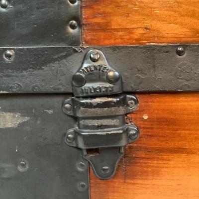 Sale Photo Thumbnail #461: Has brass key lock, front leather strap is torn 
Inside has been completely restored 
 Measures: 20.5" high x 32.5" wide x 19.75" deep