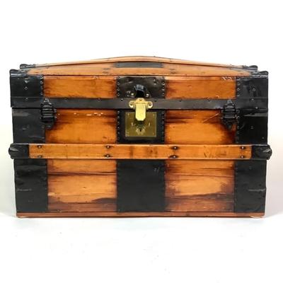 Sale Photo Thumbnail #457: Has brass key lock, front leather strap is torn 
Inside has been completely restored 
 Measures: 20.5" high x 32.5" wide x 19.75" deep
