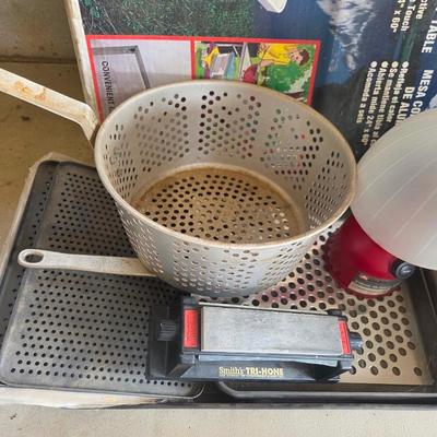 Sale Photo Thumbnail #416: Metal folding table
3 blowup air mattresses 
Battery lantern
Large stew pot