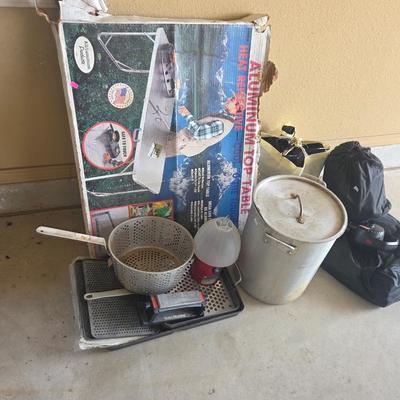 Sale Photo Thumbnail #414: Metal folding table
3 blowup air mattresses 
Battery lantern
Large stew pot