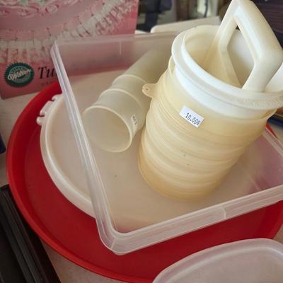 Sale Photo Thumbnail #439: Tupperware 
Cake ruffle
Large cupcake stand
Misc other plastic