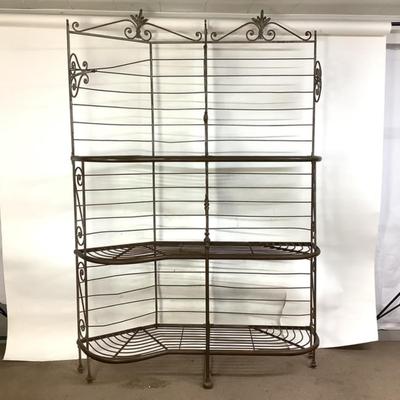 Sale Photo Thumbnail #482: This solid French bakers rack by dated from circa 1890-1910 is made of iron and wrapped in unlaquered brass trim by Echalie and Biabaud, Paris embossed on the cast iron feet. Scroll iron decor, sheaves of wheat adorn the top. The left side of this rack sl