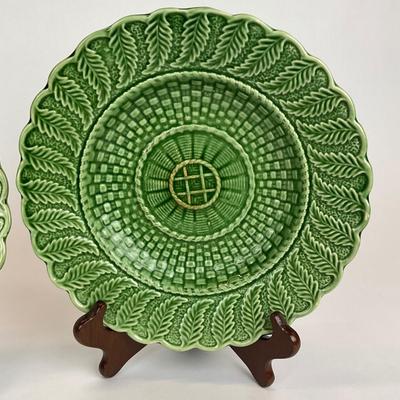 Sale Photo Thumbnail #499: These plates are discontinued. 
raised leaves & Basketweave pattern, right plate has chip and center of both plates have some wear. Please refer to photos.
Both plates measure 10.5” in diameter