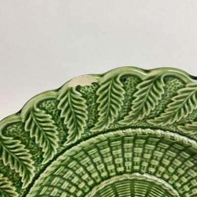 Sale Photo Thumbnail #498: These plates are discontinued. 
raised leaves & Basketweave pattern, right plate has chip and center of both plates have some wear. Please refer to photos.
Both plates measure 10.5” in diameter