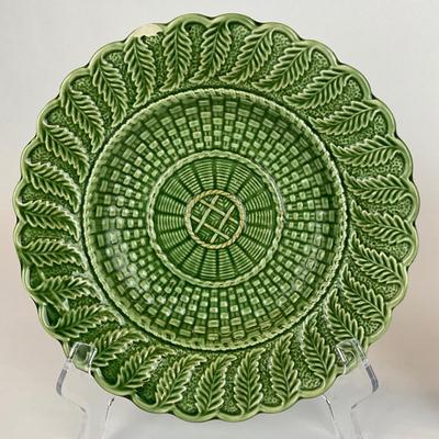Sale Photo Thumbnail #497: These plates are discontinued. 
raised leaves & Basketweave pattern, right plate has chip and center of both plates have some wear. Please refer to photos.
Both plates measure 10.5” in diameter