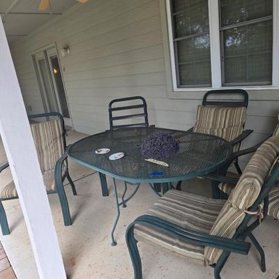 Sale Photo Thumbnail #510: Metal table & chairs with cushions