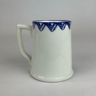 Sale Photo Thumbnail #530: Comes with hand-painted giraffe mug, an all white mug, and a gold trim all Tiffany & co. 
Measurement of giraffe mug is 4.5” in height
