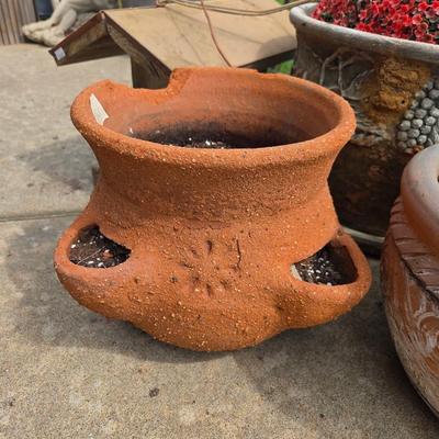 Sale Photo Thumbnail #555: Terra cotta flower pots
Birdhouses