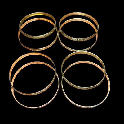 8 Gold tone bangles