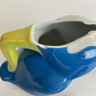 Sale Photo Thumbnail #574: This set is not signed, the large pitcher has a chip. 
Measurements:
Large pitcher is 6.5” in height
Small pitcher is 4” in height
Saucer is 5.25” in diameter
Tea cups are 2” in height