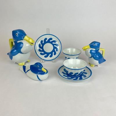 Sale Photo Thumbnail #570: This set is not signed, the large pitcher has a chip. 
Measurements:
Large pitcher is 6.5” in height
Small pitcher is 4” in height
Saucer is 5.25” in diameter
Tea cups are 2” in height