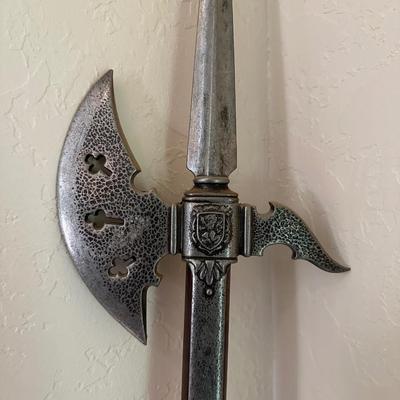 A HALBERD, A TWO-HANDED POLE WEAPON