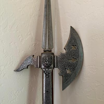 A HALBERD, A TWO-HANDED POLE WEAPON