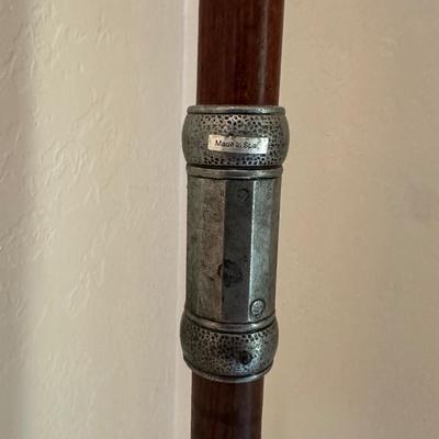 A HALBERD, A TWO-HANDED POLE WEAPON