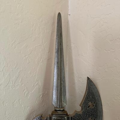 A HALBERD, A TWO-HANDED POLE WEAPON
