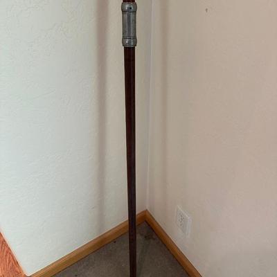 A HALBERD, A TWO-HANDED POLE WEAPON