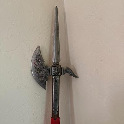 A HALBERD, A TWO-HANDED POLE WEAPON