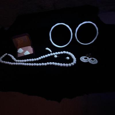 Sale Photo Thumbnail #42: Another wonderful set! Necklace with matching posts is 24”. Beautiful set of filigree earrings, set of two bracelets, and pair of art deco earrings. Art deco pair has a post that has fallen off, but it is included. These glow too! I'm not officially say