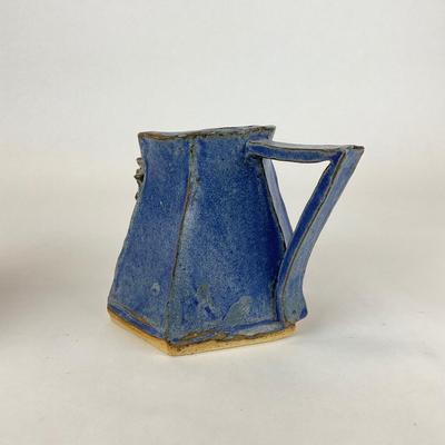 Sale Photo Thumbnail #696: Blue Pitcher and bowl is made by Elizabeth Franceschini
Measurements: 
Pitcher is 5” in height, 7” in length