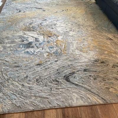 Cream, yellow and blue area rug