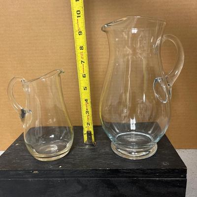 Sale Photo Thumbnail #118: What a great group of glassware items! 1940’s etched beehive vase, pair of tall stemmed candle holders, medium ice lip pitcher and small glass pitcher, Westmoreland daisy basket, Mikasa Spring Blossoms vase, and decanter with 2 wine stems