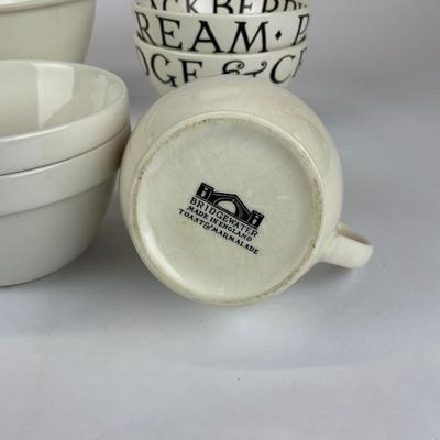 Sale Photo Thumbnail #717: Comes with a mixing bowls, bowls, a creamer, fruit bowls, tea pot, and dessert plates.
Measurements:
Mixing bowl is 5” in height, 8” in diameter