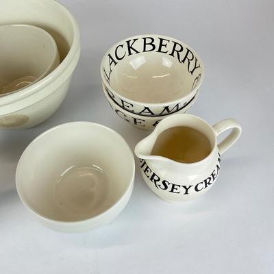 Sale Photo Thumbnail #716: Comes with a mixing bowls, bowls, a creamer, fruit bowls, tea pot, and dessert plates.
Measurements:
Mixing bowl is 5” in height, 8” in diameter