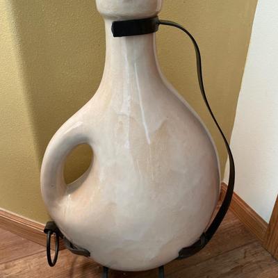 Vase in black metal holder