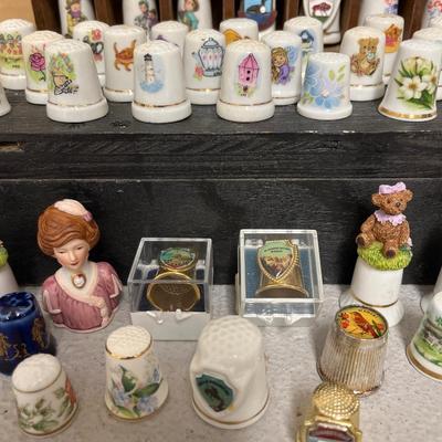 Sale Photo Thumbnail #140: Entire thimble collection and Thimbleville display