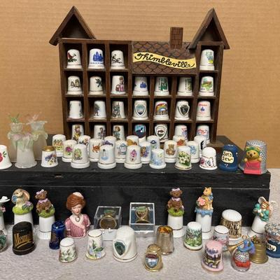 Sale Photo Thumbnail #137: Entire thimble collection and Thimbleville display