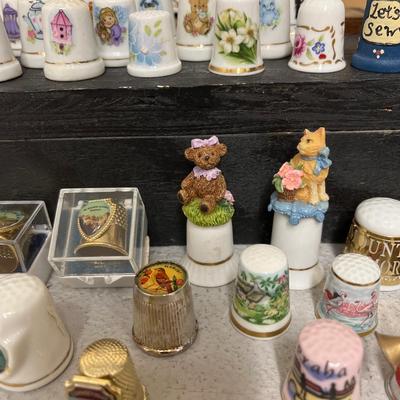 Sale Photo Thumbnail #141: Entire thimble collection and Thimbleville display
