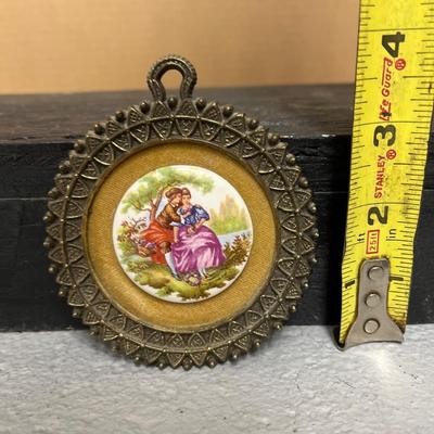 Sale Photo Thumbnail #156: Pair of Sungott porcelain cameos and Fargonard cameo wall hanging