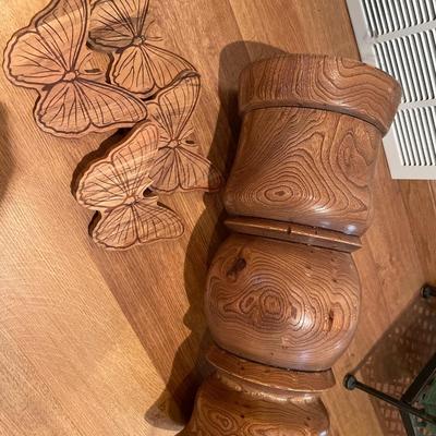 Solid wood pedestal with four wood, butterflies, and holder