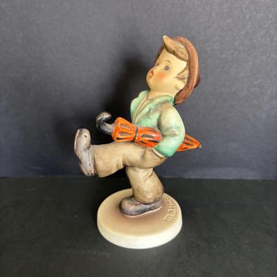 LOT 88: Hummel Figurines: Sister, The Doctor (127) & Happy Traveler