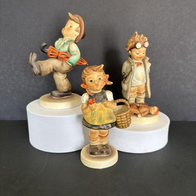 LOT 88: Hummel Figurines: Sister, The Doctor (127) & Happy Traveler