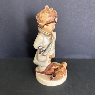 LOT 88: Hummel Figurines: Sister, The Doctor (127) & Happy Traveler