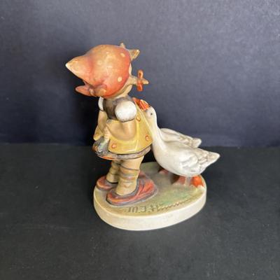 LOT 89: Hummel Figurines: Bird Watching, Goose Girl and Good-bye